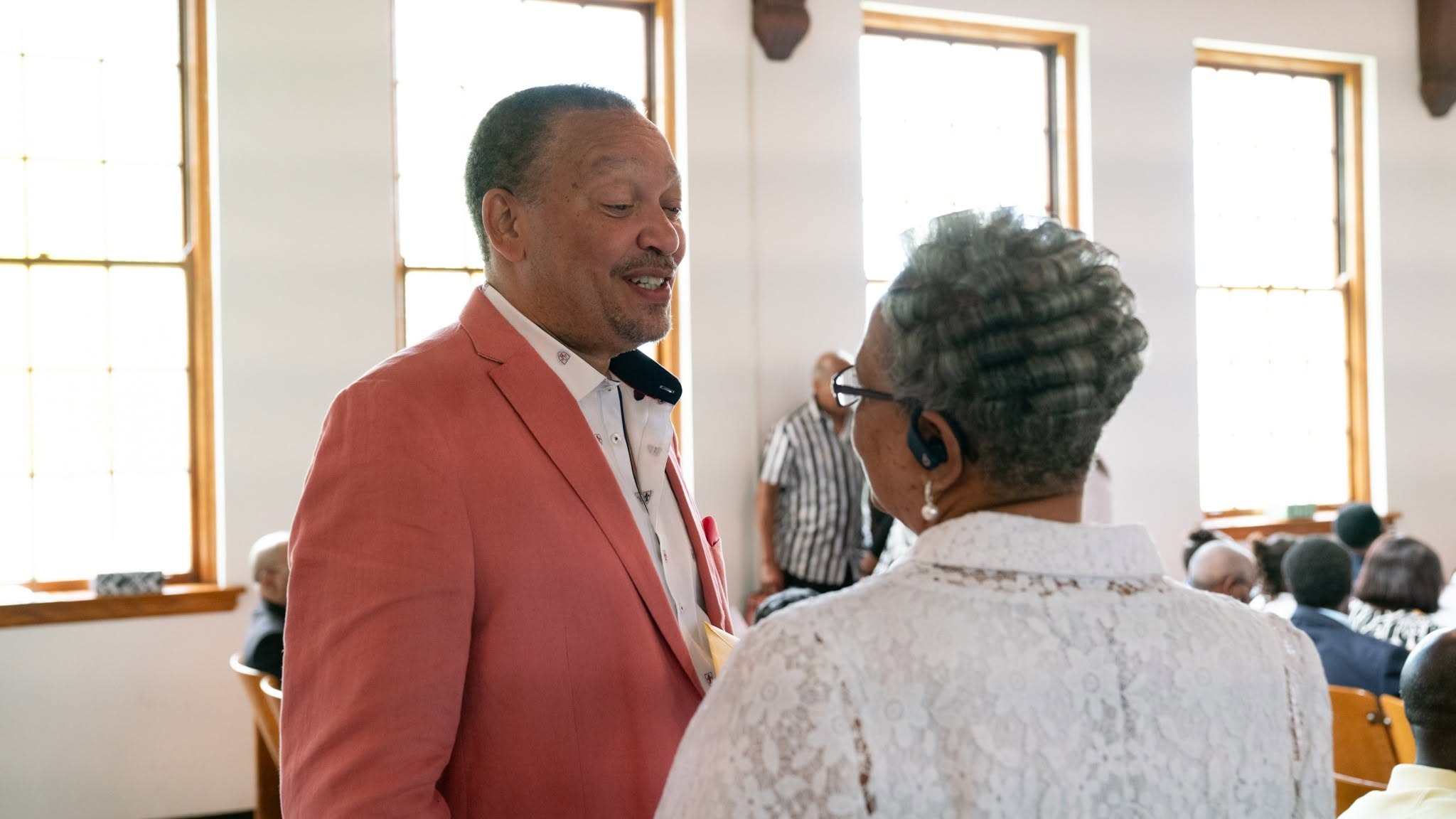 A warm greeting — love in the house of the Lord