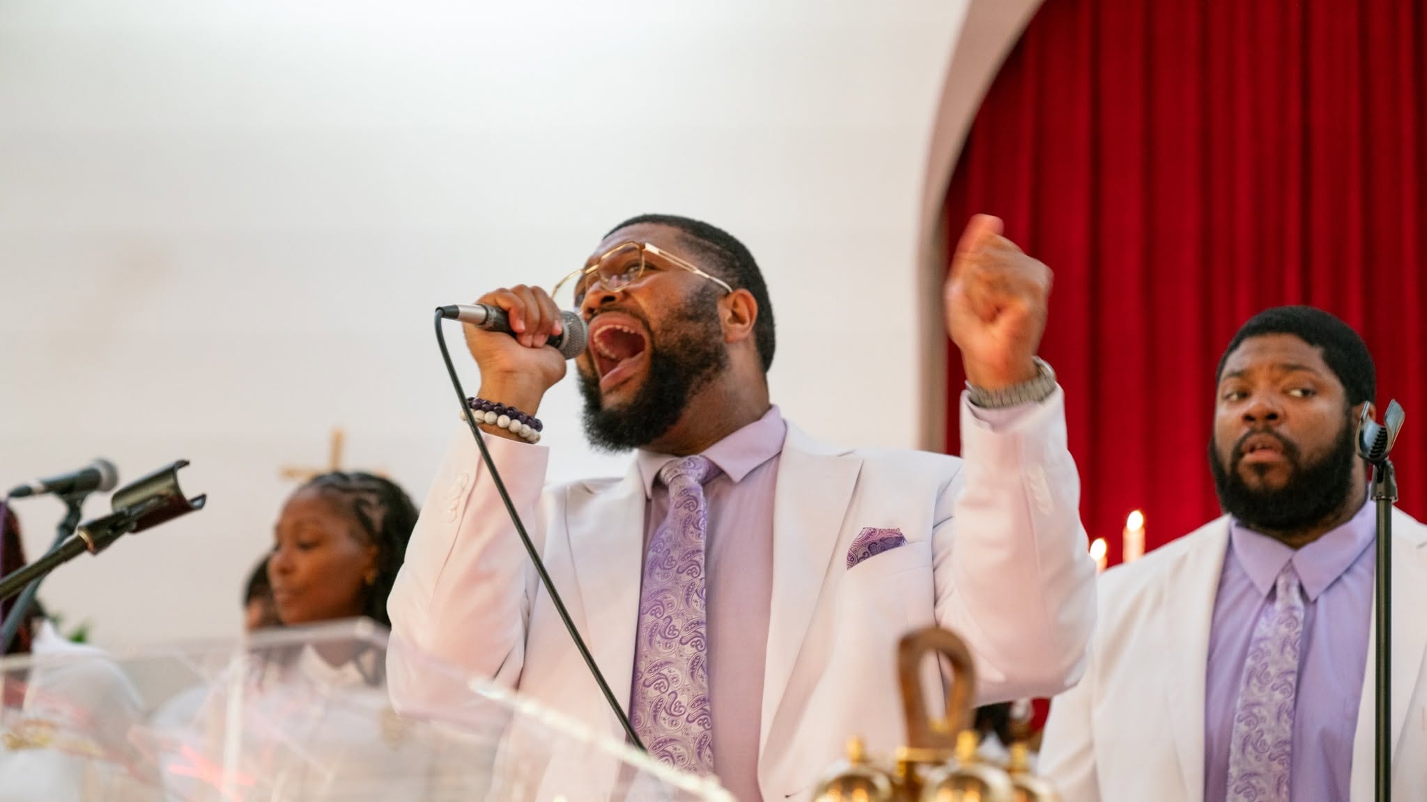 The children perform — youth choir dressed in white